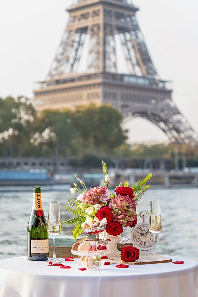 Paris proposal ideas private table with Champagne along the Seine River